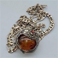 STERLING SILVER LARGE AMBER BALL ENCASED IN