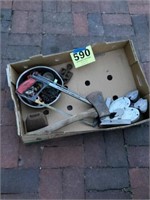Box slot with cowbell ax saw and other things