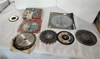 An assortment of Saw blades and Cut off wheels