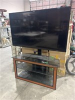 Samsung 60" TV and stand 
Tv works just no cords