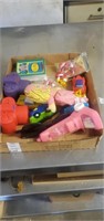 Box of assorted toys.