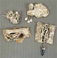 4 artisan sterling silver brooches set with