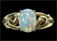 10K Yellow gold cabochon opal ring with round