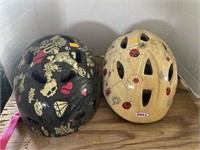 2 bicycles helmets