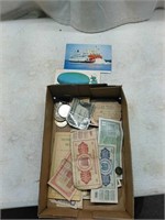 Foreign money and old postcards