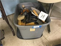 Tote full of trowels and sponges