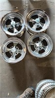 4- 14X 6.5, 4 bolt Cal Chrome wheels