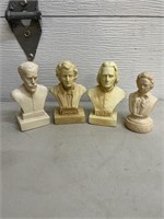Set of four small busts that seem to be of f