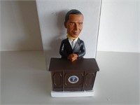 OBAMA BOBBLE HEAD AT DESK