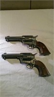 Two Old West Colt 45 commemorative pistols marked