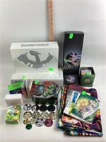 Empty Pokémon boxes, pogs, dice accessories