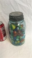 Canning jar full of old marbles