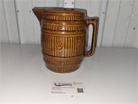 brown barrel pitcher