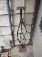 Tall metal candle holder