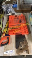 Handsaws, socket set, drill bits, sponges