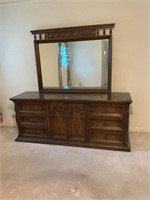 Nice wooden dresser with mirror. Heavy