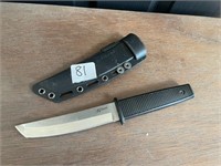 Secure-EX knife in plastic sheath