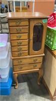 Jewelry armoire, loose leg