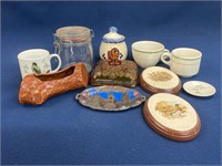 Assorted items including ceramic wall decor,