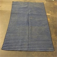 Blue braided rug