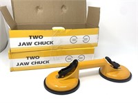 New lot of 2 metal two jaw chucks with suction