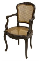 LOUIS XV STYLE CARVED CANED BEECHWOOD FAUTEUIL
