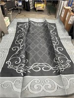 Large outdoor rug 136 in long 103 in wide needs