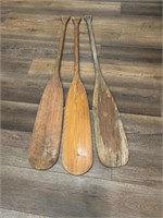Three (3) wood paddles