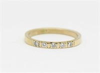 Lady's 14kt yellow gold pave set band ring,