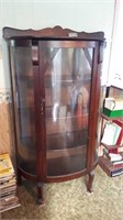 Bow front china cabinet. Crack in door glass.85
