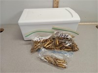 22-250 brass approx 100 rounds, and drawer.
