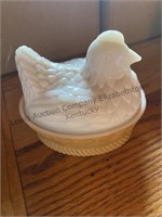 White milk glass hen on a nest by Avon . Very