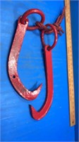 Red heavy steel log puller