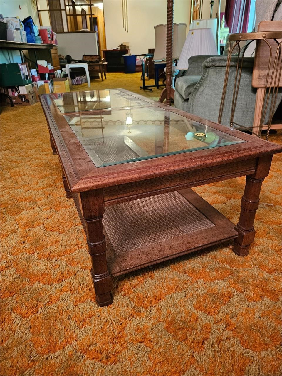 Cane bottom/ Glass top coffee table