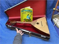 Balalaika instrument 27in long w/ case & book