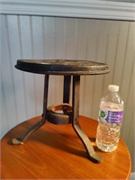 Primitive metal stool.