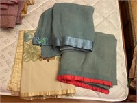 3 Satin trimmed blankets stored with moth balls