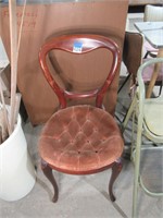 vintage chair with cushioned seat
