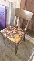 Two padded bottom wooden chairs