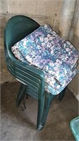 Four pvc patio chairs with cushions