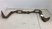 Short,  heavy chain with hook at each end