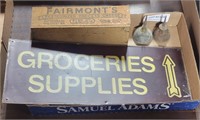 FLAT OF OIL CANS, GROCERY SIGN, & CHEESE BOX