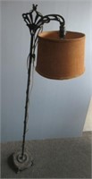 Vintage cast floor lamp. Measures: 57" Tall.