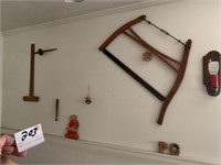 Bow Saw and Contents on wall