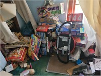contents of board game closet and the corner