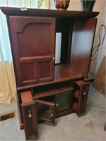 SOLID WOOD ENTERTAINMENT CENTER (BRING HELP)