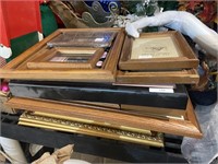 assorted pictures and picture frames including