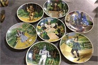Set of 7 Wizard of Oz collector plates, with wall