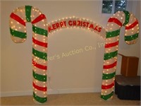 3pc lighted outdoor candy canes and Merry