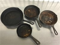 One 10”, two 8” And one 6” cast iron skillets